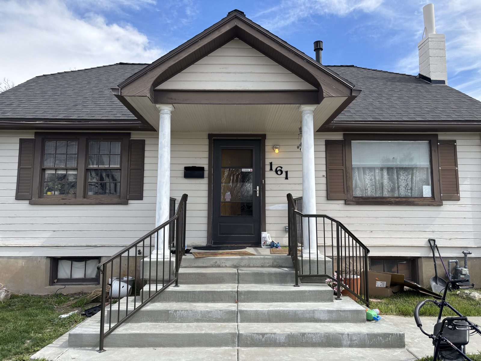 Completed porch handrail install on bungalow